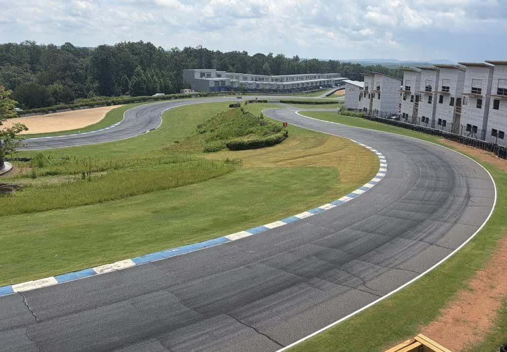 The circuit seen from villa deck level, with the Circuit Villas curving along the outside of the turn
